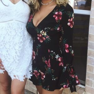 Floral black hawaii print long sleeve romper!
